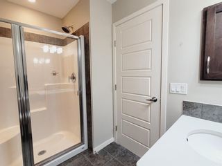 Photo 18: 106 Panatella Walk NW in Calgary: Panorama Hills Row/Townhouse for sale : MLS®# A1206869