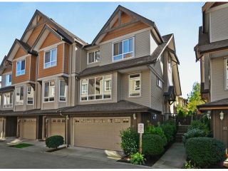 Photo 1: 13 16772 61ST Avenue in Surrey: Cloverdale BC Townhouse for sale in "Laredo" (Cloverdale)  : MLS®# F1322525