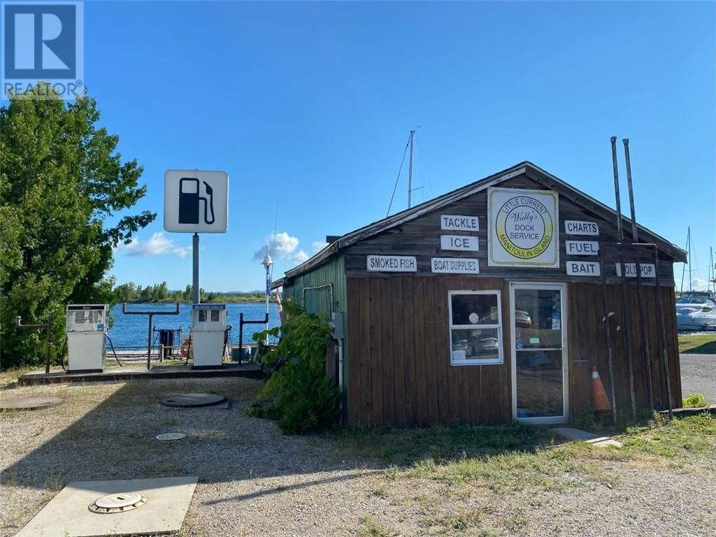 Main Photo: 32 Water Street E in Little Current: Retail for sale : MLS®# 2105298
