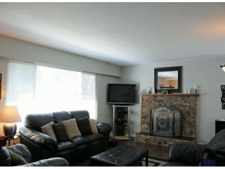 Photo 2: 7325 142A ST in Surrey: East Newton House for sale