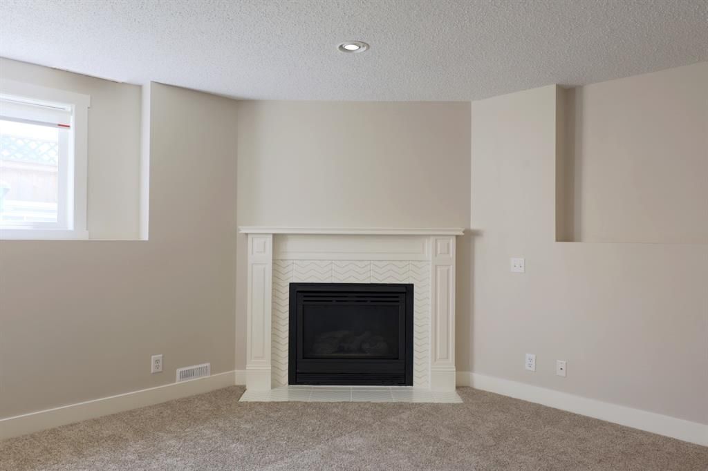 Photo 37: Photos: 111 Woodside Circle NW: Airdrie Detached for sale : MLS®# A1245479