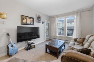 Photo 11: 310 201 Sunset Drive: Cochrane Apartment for sale : MLS®# A2033597