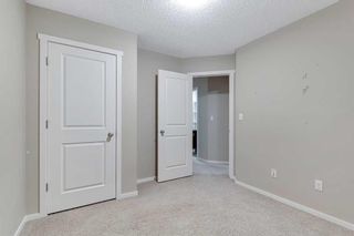 Photo 19: 1713 125 Panatella Way NW in Calgary: Panorama Hills Row/Townhouse for sale : MLS®# A2106214