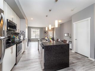 Photo 8: 38 300 Evanscreek Court NW in Calgary: Evanston Row/Townhouse for sale : MLS®# A1210568