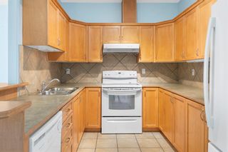 Photo 11: 319 248 Sunterra Ridge Place: Cochrane Apartment for sale : MLS®# A2004149