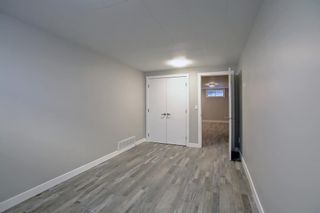 Photo 39: 102 Winston Drive SW in Calgary: Westgate Detached for sale : MLS®# A2012680