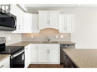 Photo 7: 1165 Sutherland Avenue Unit# 406 in Kelowna: House for sale : MLS®# 10312969