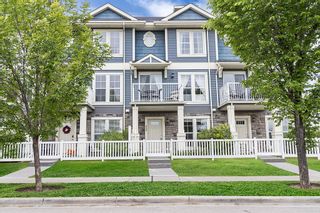 Photo 1: 655 Auburn Bay Boulevard SE in Calgary: Auburn Bay Row/Townhouse for sale : MLS®# A2052275