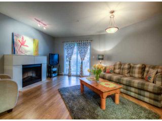 Photo 1: # 212 19340 65TH AV in Surrey: Clayton Condo for sale in "Esprit at Southlands" (Cloverdale)  : MLS®# F1313921