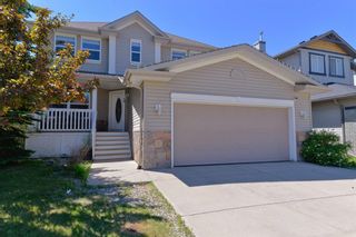 Photo 2: 49 Cougarstone Terrace SW in Calgary: Cougar Ridge Detached for sale : MLS®# A1242065
