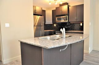 Photo 2: 2101 5605 HENWOOD Street SW in Calgary: Garrison Green Apartment for sale : MLS®# C4204085