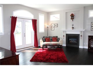 Photo 3: 1319 SOBALL Street in Coquitlam: Burke Mountain House for sale in "BURKE MOUNTAIN HEIGHTS" : MLS®# V1024016