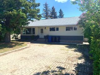 Photo 1: 10711 103 Avenue in Fort St. John: Fort St. John - City NW House for sale : MLS®# R2703941