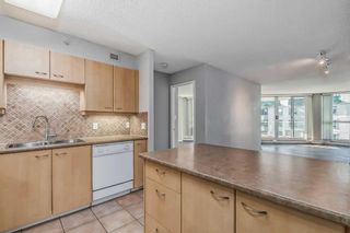Photo 7: 804 804 3 Avenue SW in Calgary: Eau Claire Apartment for sale : MLS®# A2078494