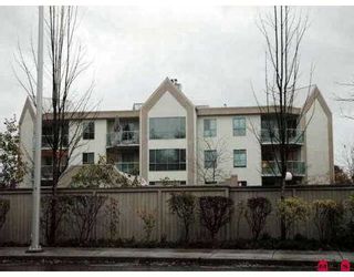 Photo 1: 9914 148TH Street in Surrey: Guildford Townhouse for sale in "High Point Court" (North Surrey)  : MLS®# F2624922
