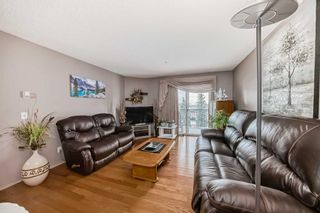 Photo 10: 411 55 Arbour Grove Close NW in Calgary: Arbour Lake Apartment for sale : MLS®# A2123411