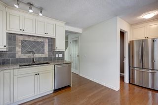 Photo 9: 625 Queensland Place SE in Calgary: Queensland Row/Townhouse for sale : MLS®# A2051134