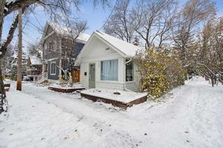 Photo 2: 117 8 Street NW in Calgary: Sunnyside Detached for sale : MLS®# A2090404