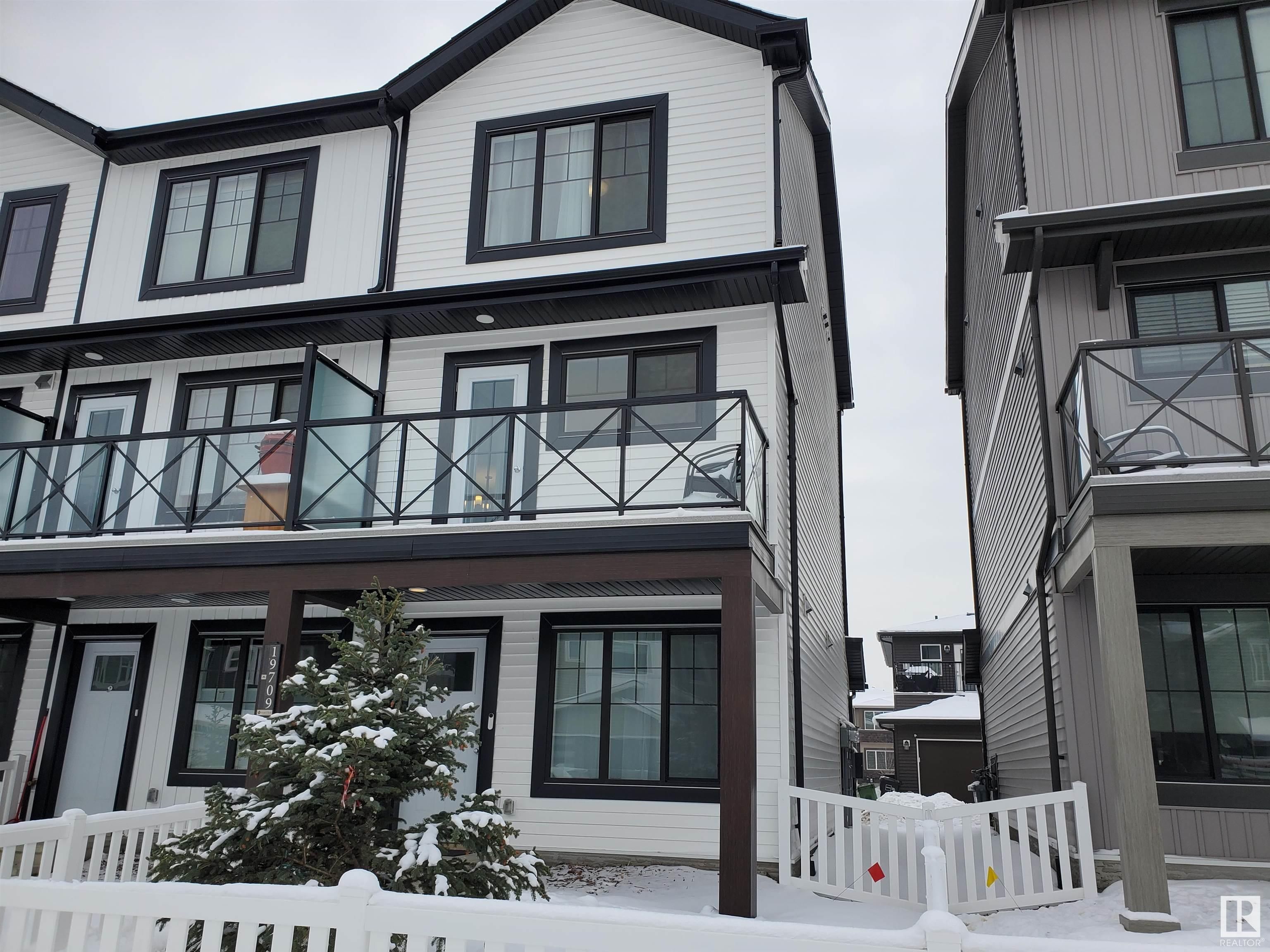 Main Photo: 19709 28 Avenue in Edmonton: Zone 57 Attached Home for sale : MLS®# E4325022