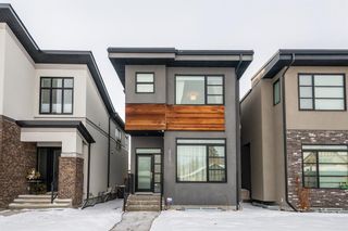 Main Photo: 215 18 Street NW in Calgary: West Hillhurst Detached for sale : MLS®# A2023802