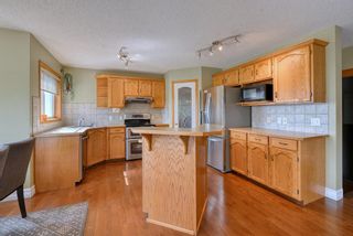 Photo 9: 104 Country Hills Park NW in Calgary: Country Hills Detached for sale : MLS®# A1232311