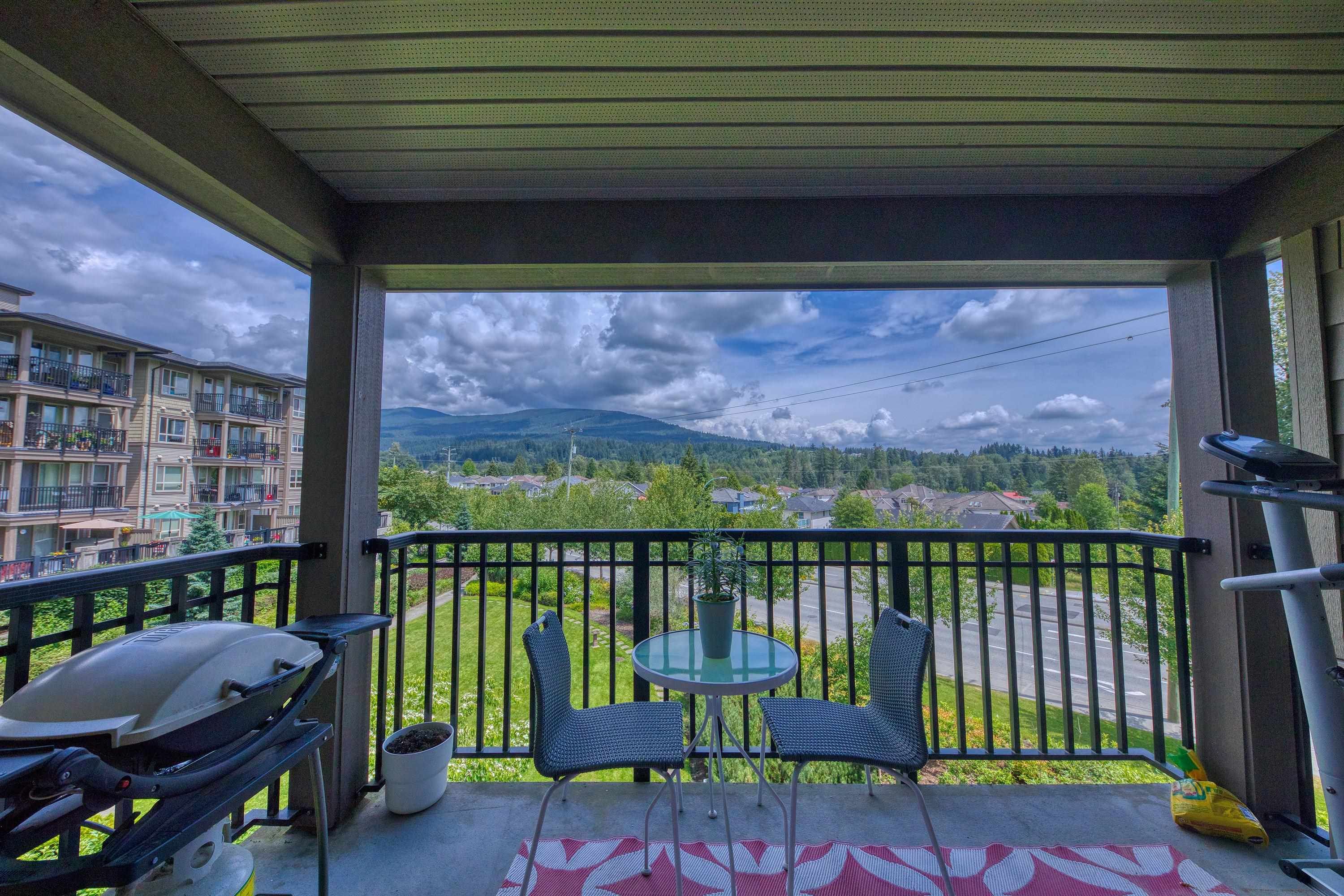 Main Photo: 313 3178 DAYANEE SPRINGS BOULEVARD in Coquitlam: Westwood Plateau Condo for sale : MLS®# R2708389