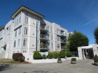 Photo 1: 203 32075 GEORGE FERGUSON Way in Abbotsford: Abbotsford West Condo for sale in "ARBOUR COURT" : MLS®# R2290695