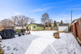 Photo 4: 411 Queensland Circle SE in Calgary: Queensland Detached for sale : MLS®# A1193029