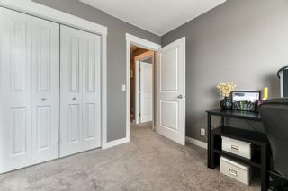 Photo 21: 11 West Coach Manor SW in Calgary: West Springs Row/Townhouse for sale : MLS®# A2035861