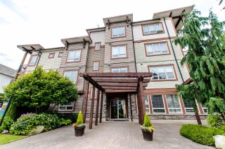 Photo 1: 100 15268 18 Avenue in Surrey: King George Corridor Condo for sale in "Park Place" (South Surrey White Rock)  : MLS®# R2295314