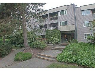 Photo 1: 105 1209 HOWIE Avenue in Coquitlam: Central Coquitlam Condo for sale in "CREEKSIDE MANOR" : MLS®# V1136026
