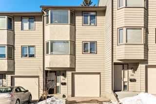 Photo 1: 108 Glamis Terrace SW in Calgary: Glamorgan Row/Townhouse for sale : MLS®# A1070053