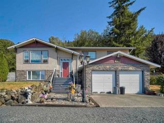 Photo 1: 41015 BELROSE Road in Abbotsford: Sumas Prairie House for sale : MLS®# R2734509