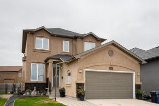 Photo 1: 309 Amber Trail in Winnipeg: Amber Trails Residential for sale (4F)  : MLS®# 202211247