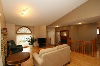 Photo 10: 2 WEST ANDISON Close: Cochrane House for sale : MLS®# C4141938