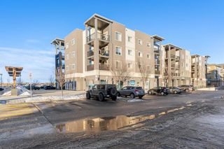Photo 1: 6406 403 Mackenzie Way SW: Airdrie Apartment for sale : MLS®# A2108233