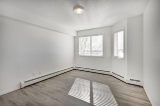 Photo 13: 2109 7451 Springbank Boulevard SW in Calgary: Springbank Hill Apartment for sale : MLS®# A2034205