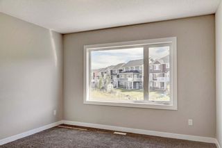 Photo 22: 102 501 RIVER HEIGHTS Drive: Cochrane Row/Townhouse for sale : MLS®# C4266118