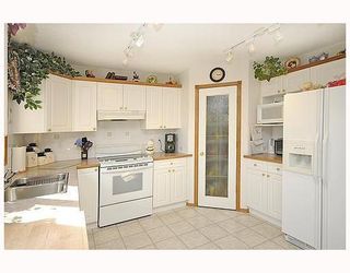 Photo 6: 1229 WOODSIDE Way NW: Airdrie Residential Detached Single Family for sale : MLS®# C3396202