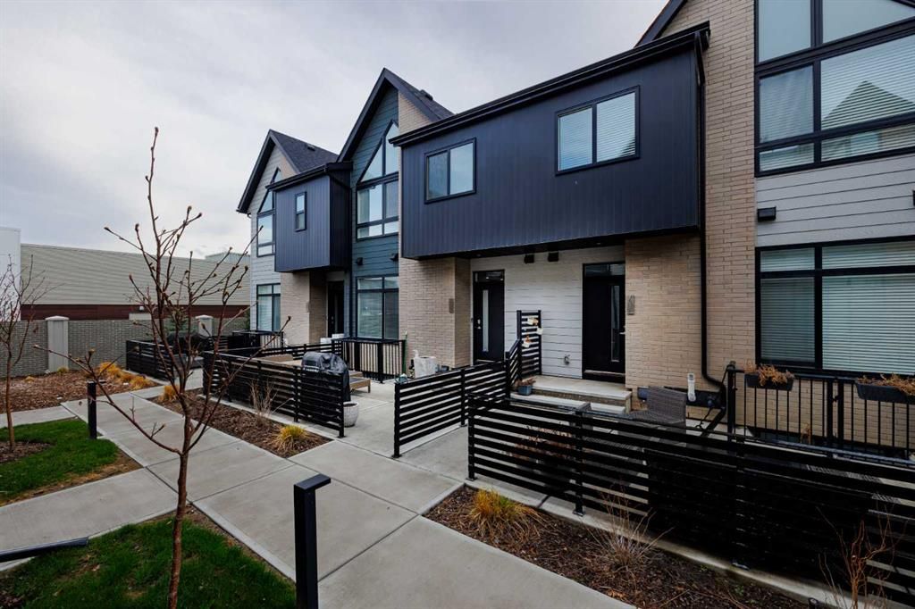 Main Photo: 209 Sage Meadows Gardens NW in Calgary: Sage Hill Row/Townhouse for sale : MLS®# A2129681
