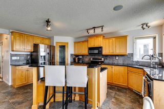 Photo 7: 7771 Springbank Way SW in Calgary: Springbank Hill Detached for sale : MLS®# A2058722