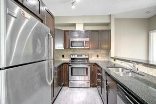 Photo 5: 209 76 Panatella Road NW in Calgary: Panorama Hills Apartment for sale : MLS®# A1244884