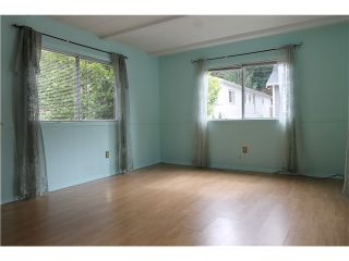 Photo 2: 54 3295 SUNNYSIDE Road: Anmore Manufactured Home for sale in "COUNTRYSIDE VILLAGE" (Port Moody)  : MLS®# V999785
