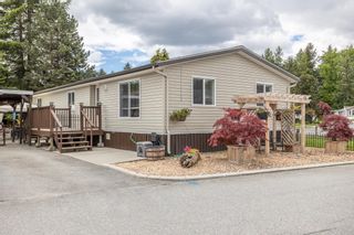 Photo 1: 19678 PONDEROSA Place in Pitt Meadows: Central Meadows Manufactured Home for sale in "MEADOW HIGHLANDS" : MLS®# R2691852