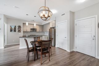 Photo 2: 104 300 Auburn Meadows Manor SE in Calgary: Auburn Bay Apartment for sale : MLS®# A2022411