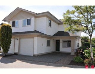 Photo 1: 207 16233 82ND Avenue in Surrey: Fleetwood Tynehead Townhouse for sale in "Orchards" : MLS®# F2918236