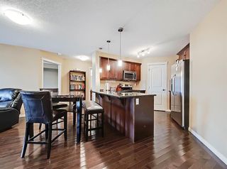 Photo 4: 2212 130 Panatella Street NW in Calgary: Panorama Hills Apartment for sale : MLS®# A1216369