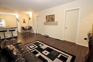 Photo 2: 421 Talbot Avenue in Winnipeg: Elmwood Residential for sale (3A)  : MLS®# 202212099