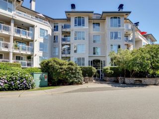 Photo 1: 319 3608 DEERCREST Drive in North Vancouver: Roche Point Condo for sale in "Deerfield" : MLS®# R2712853