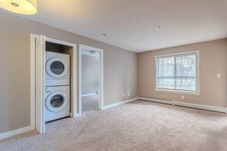 Photo 7: 211 403 Mackenzie Way SW: Airdrie Apartment for sale : MLS®# A2125740